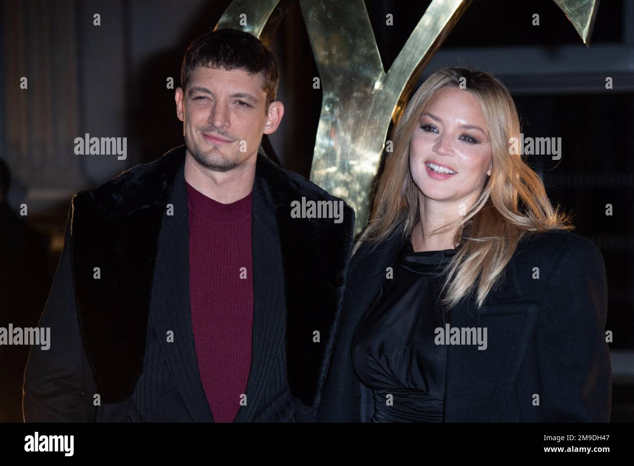Neils Schneider and Virginie Efira attending the Saint Laurent Menswear