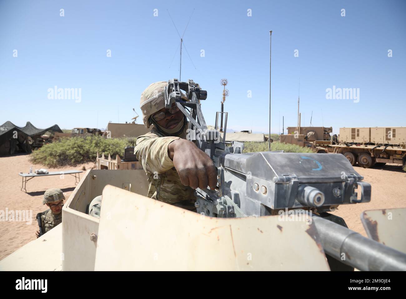 A Charlie Battery 3-2 Air Defense Artillery Battalion Soldier performs a functions check on his MK-19 grenade launcher during Roving Sands 2022. Roving Sands is an exercise is an opportunity to influence the operational capability and training methods used by Air Defense Artillery Brigades to test their systems in large scale combat simulations. Stock Photo