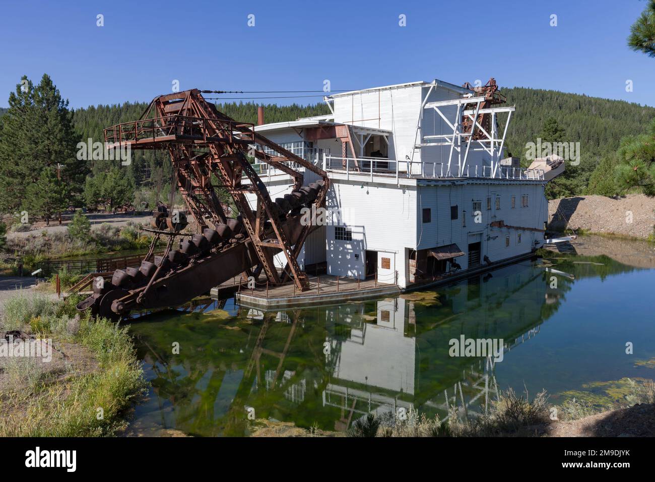 Sumpter Valley Gold Dredge #3 sits idle in Sumpter, Oregon. Between 1912 and 1954 3 gold dredges operated in Sumpter Valley with the last one shutting Stock Photo