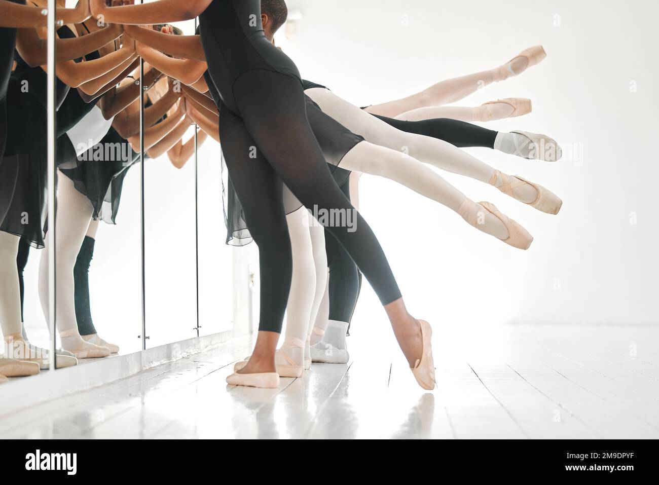 A world class ballet class. a group of unrecognisable ballet dancers ...