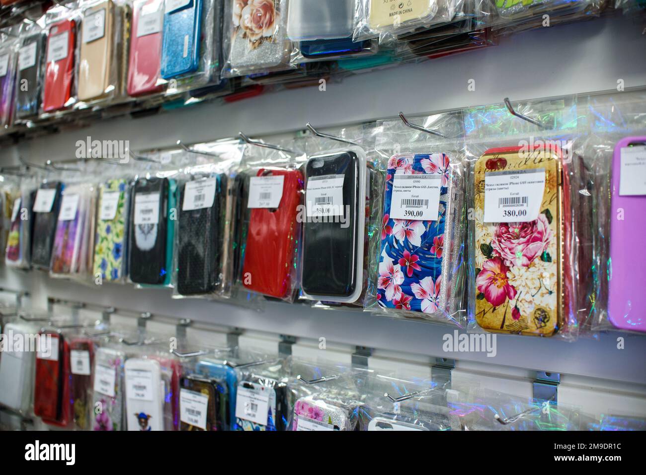 VICHUGA, RUSSIA - APRIL 21, 2018: Cell phone cases on the shelf in a retail store Stock Photo