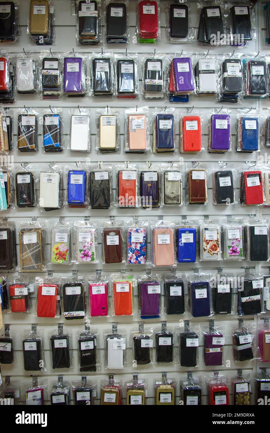 VICHUGA, RUSSIA - APRIL 21, 2018: Cell phone cases on the shelf in a retail store Stock Photo