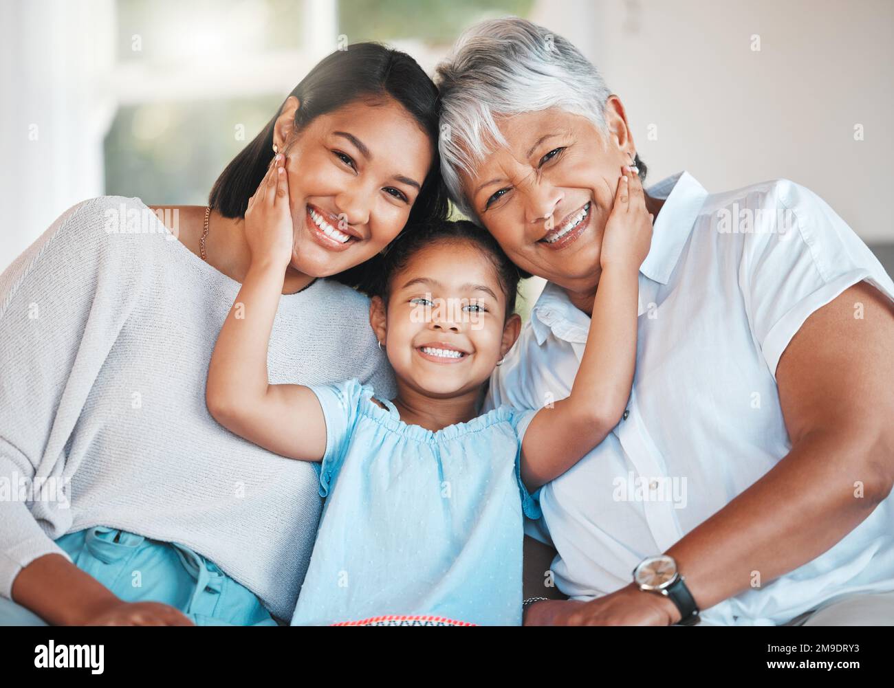 Three generations of queens. Portrait of a mature woman boding with her ...