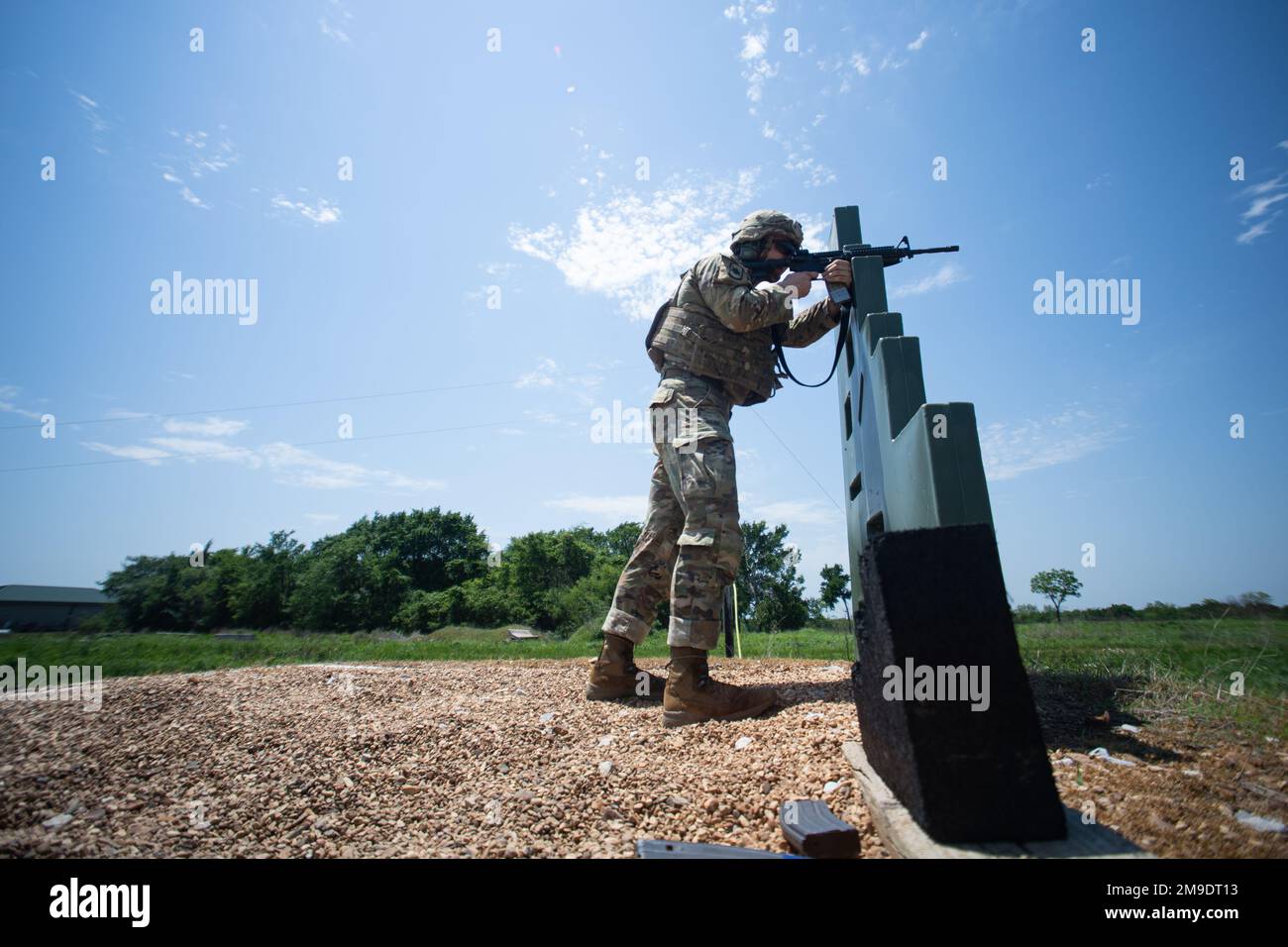 Staff Sgt. Joseph Dunn, an Arkansas National Guard Soldier, fires an M4 during a weapons skills challenge at the National Guard Region V Best Warrior Competition, Camp Gruber Training Center, Okla., May 18, 2022. The annual competition brings together top-tier soldiers to challenge them on a variety of Army warrior tasks. (Oklahoma National Guard photo by Spc. Danielle Rayon) Stock Photo