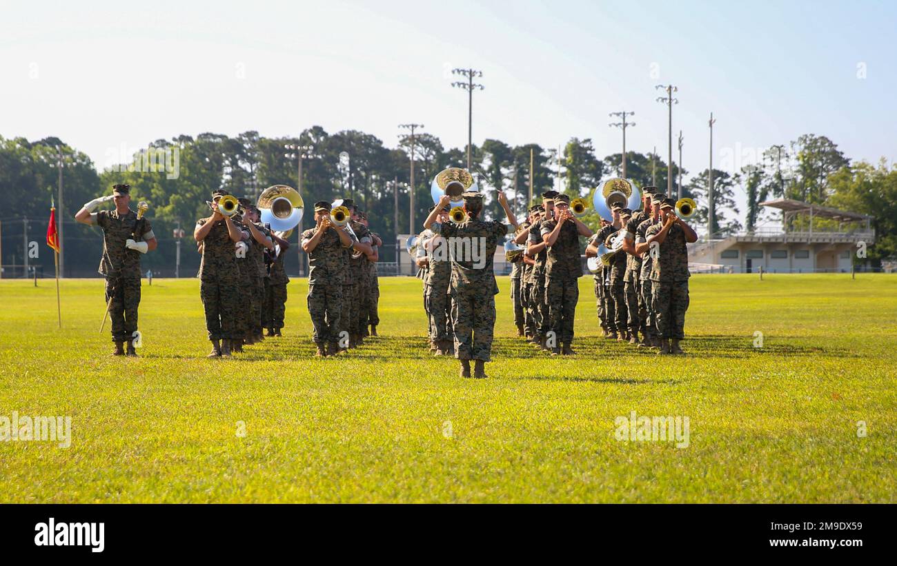 The 2d Marine Division Band performs the National Anthem at a relief and appointment ceremony on Camp Lejeune, North Carolina, May 18, 2022. After 2 years serving the division, Sgt. Maj. Krause moves on to be the sergeant major for Defense Information Systems Agency. Stock Photo