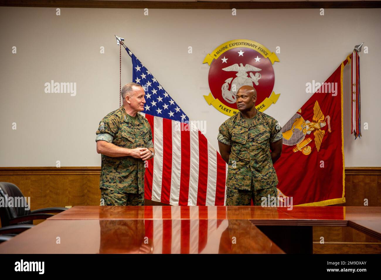 U.S. Marine Corps Lt. Gen. William Jurney presents a commemorative plaque to Brig. Gen. Anthony Henderson on Camp Lejeune, North Carolina, May 18, 2022. Jurney is the II Marine Expeditionary Force Commanding General and Henderson is the II MEF Deputy Commanding General. Stock Photo