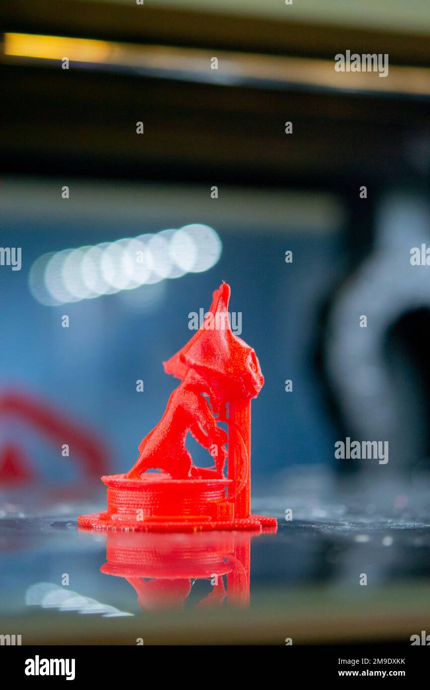 Model printed on a 3D printer from red plastic close-up. Stock Photo