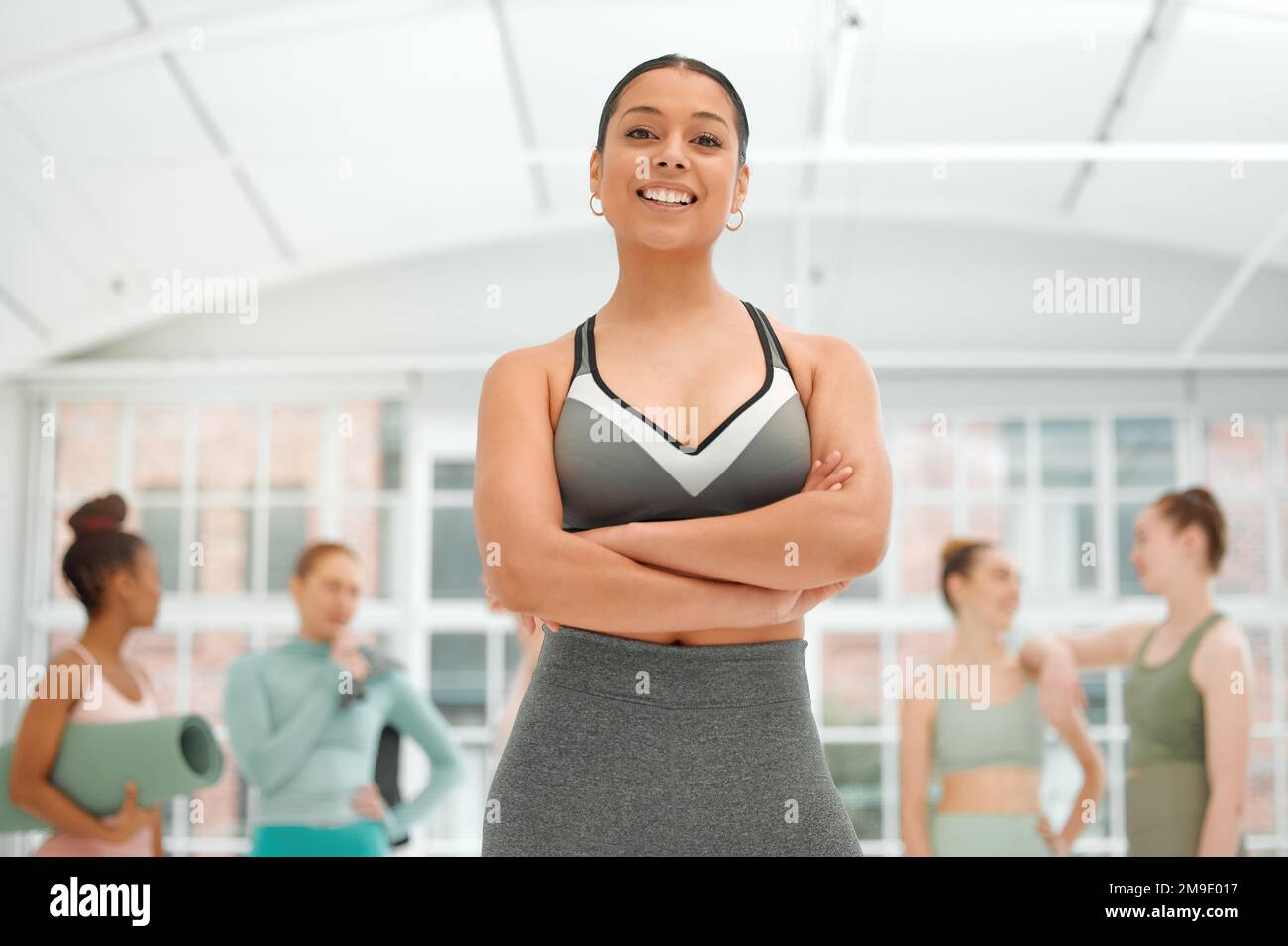 Nothing is more fun than seeing results. a beautiful young woman at a fitness class. Stock Photo