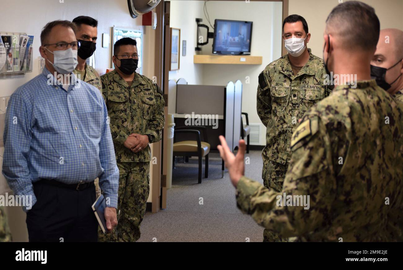 Dr. Brian Lein, MD, assistant director for Healthcare Administration at the Defense Health Agency is provided a behavioral health assessment with Mental Health Department at Naval Hospital Bremerton, May 18, 2022. Lein was welcomed by NHB command leadership along with Col. Jonathan Taylor, Puget Sound MHS Market director and Madigan Army Medical Center commander, to meet and greet with NHB staff at several locales including Mental Health department and the Main Operating Room before convening with top hospital officials for a round table meeting to discuss such topics as current hiring practic Stock Photo