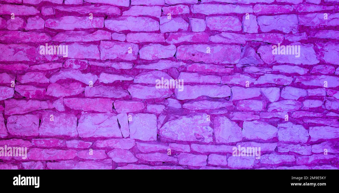 old violet purple brick wall texture closeup pink stone blocks wall old violet purple brick wall texture closeup pink stone blocks wall