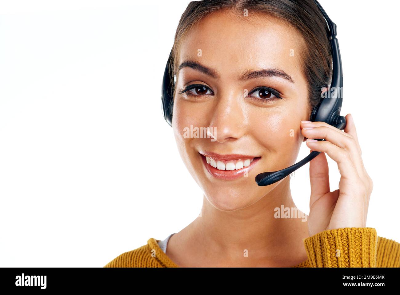 Telemarketing, product placement and portrait of woman isolated with smile on white background. Call center agency, crm and girl in headset at Stock Photo