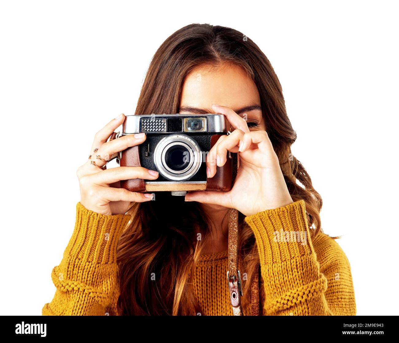 Photography woman, holding camera and studio for creativity, photoshoot or blog content by white background. Isolated photographer, creative and retro Stock Photo