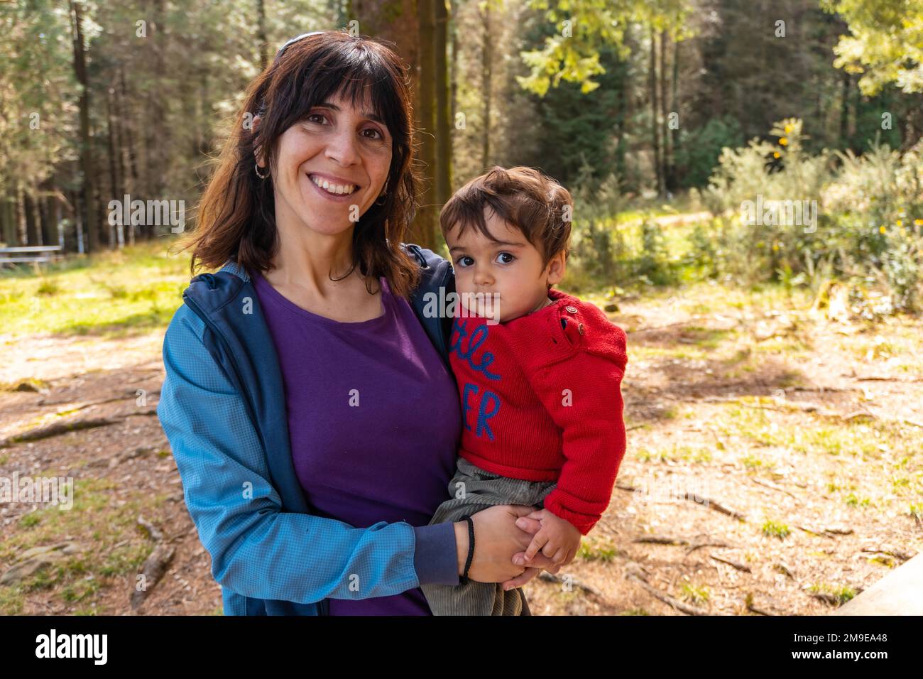 Basque Mother A mother with her son on top of Mount Andatza in the forest in the town ...