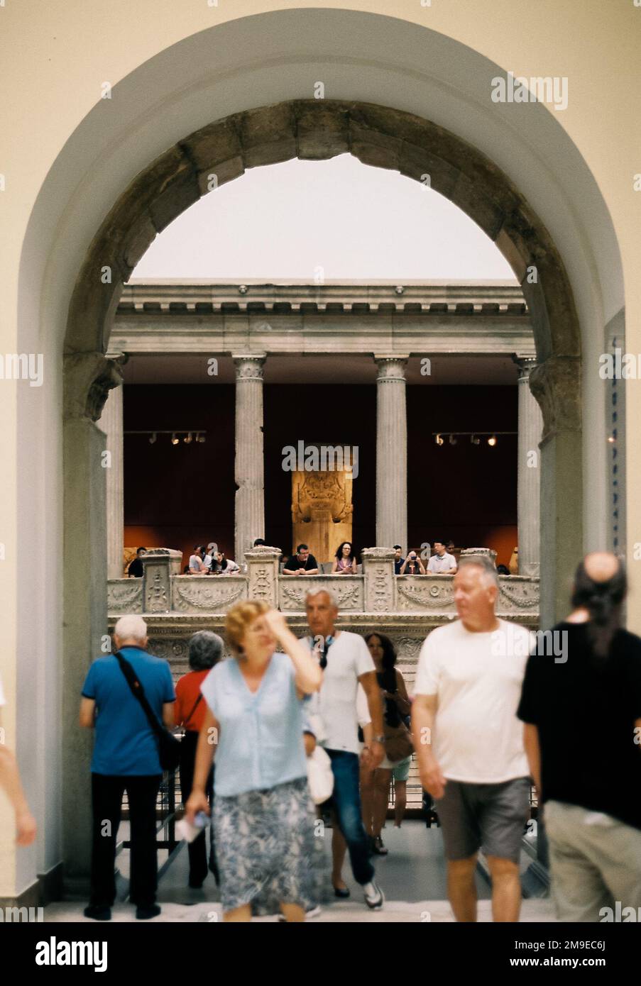 Interior of Pergamon Museum. Museum visitors in the foreground. Analog photography shot with Minolta X-300. Stock Photo