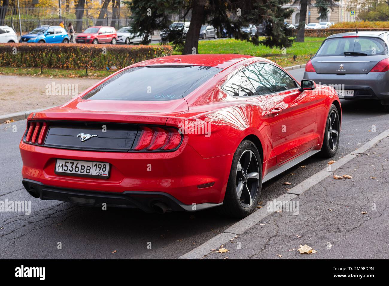 St-Petersburg, Russia - October 7, 2021: Rear view of the sixth generation Ford Mustang GT, red sporty coupe car stands parked on the street Stock Photo