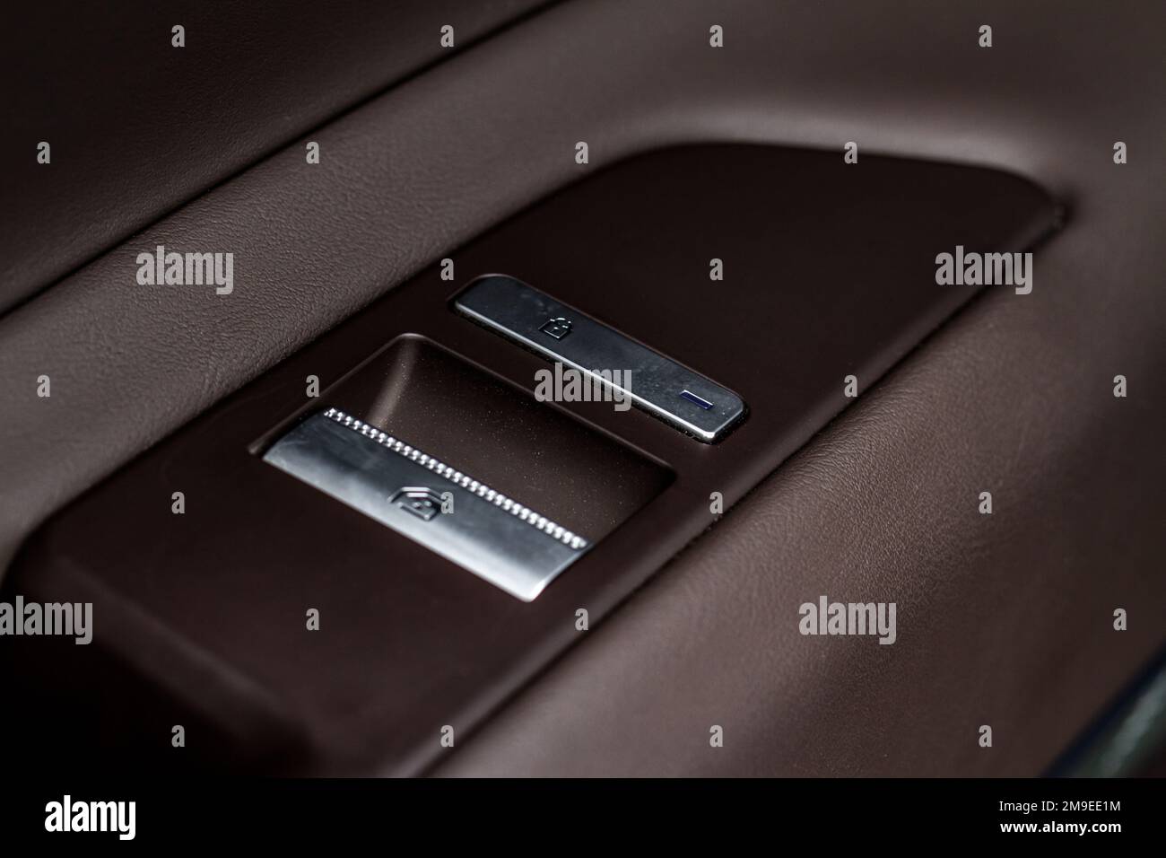 Interior doors of the car. Car door panel with buttons for lock car and