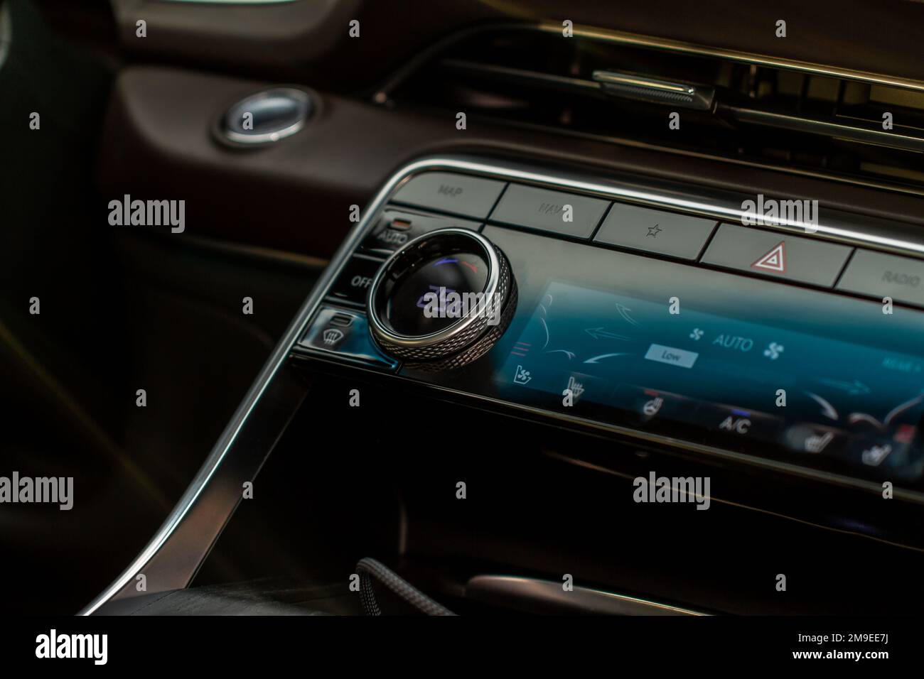Modern car. Driver’s temperature control. Car air conditioning system