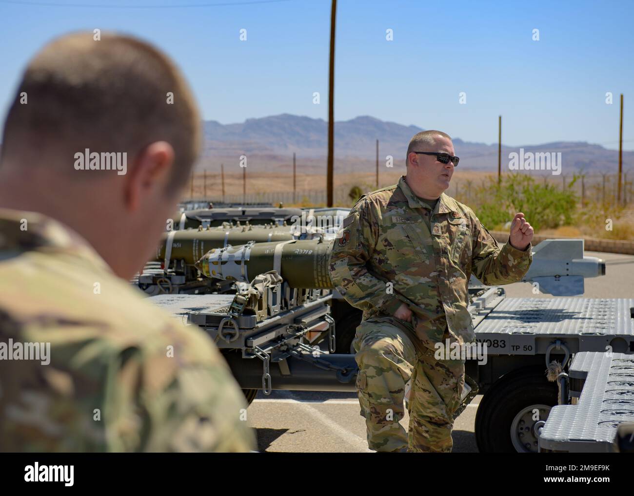 Senior Master Sgt. Justin Steffens talks with member of 132d