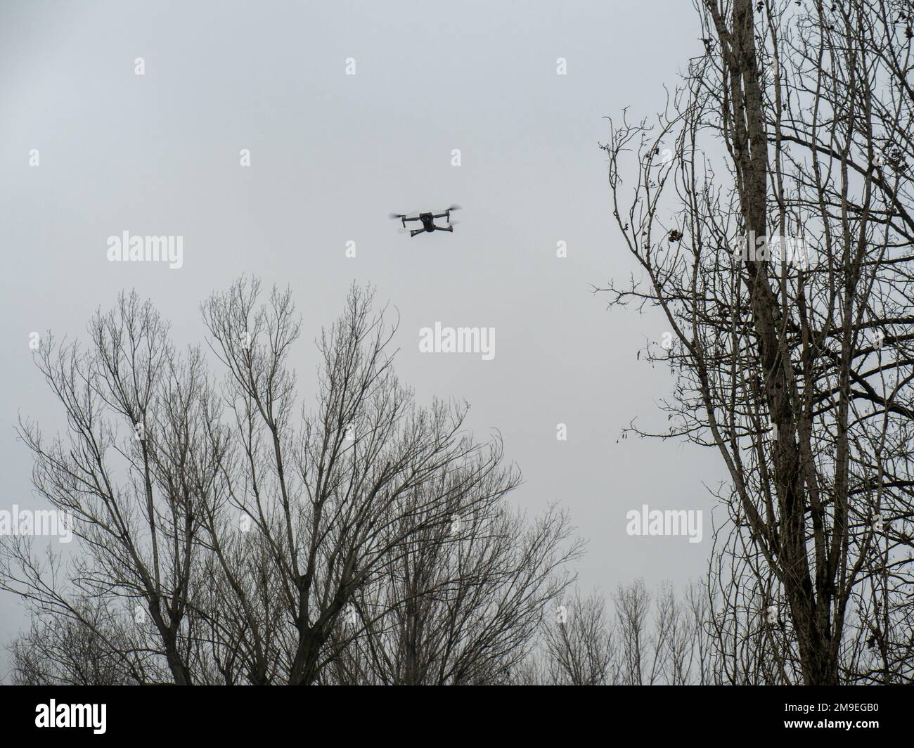 Lombardy, Italy - 6th January 2022 DJI Mavic Air 2s drone 4k camera copter  flying hovering in a park a cloudy day Stock Photo - Alamy