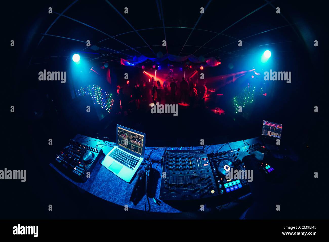 DJ mixer controller panel for electronic music in night club Stock ...