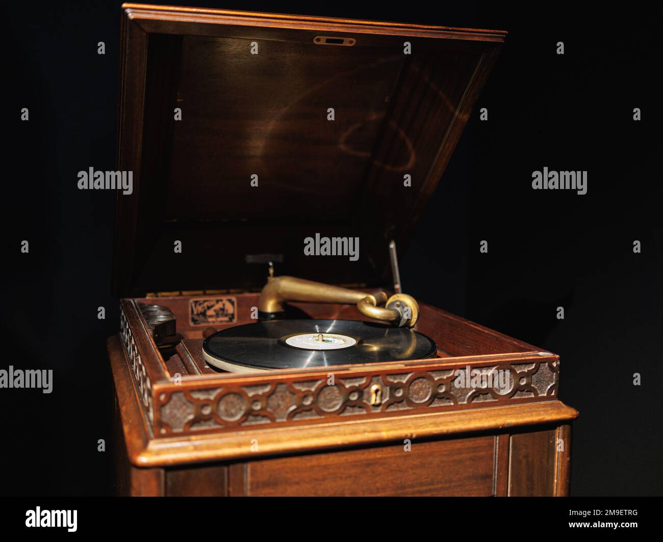 Antique Wooden Record Player with a Vinyl Record on it Stock Photo Alamy