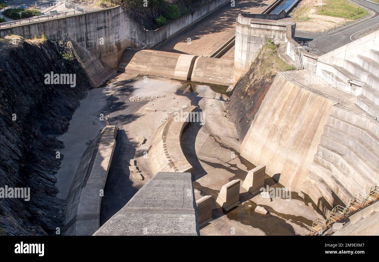 Concrete stepped spillway of Hinze Dam at Advancetown, SE Queensland, Australia. Flood mitigation engineering for potable water catchment, reservoir. Stock Photo