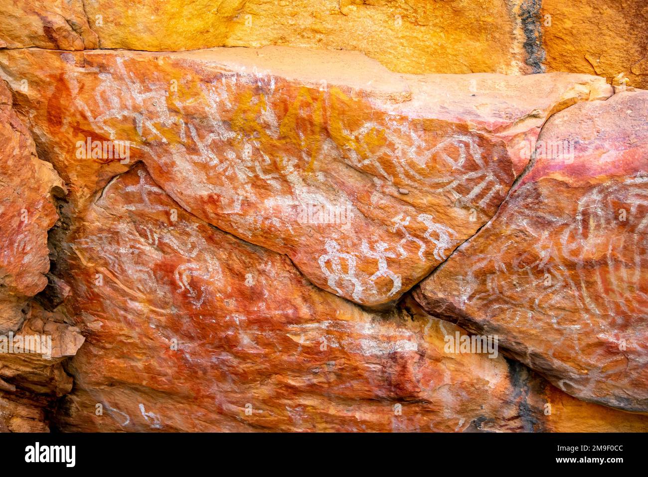 Indigenous Aboriginal rock paintings (artwork) by the Ngiyampaa people at Mount Grenfell, 70km west of Cobar, New South Wales, Australia Stock Photo