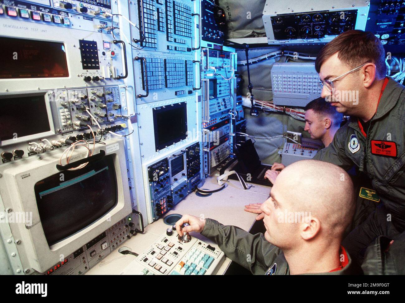 Intelligence personnel collecting data from sensor gear on an Air Combat Command 55th Wing RC