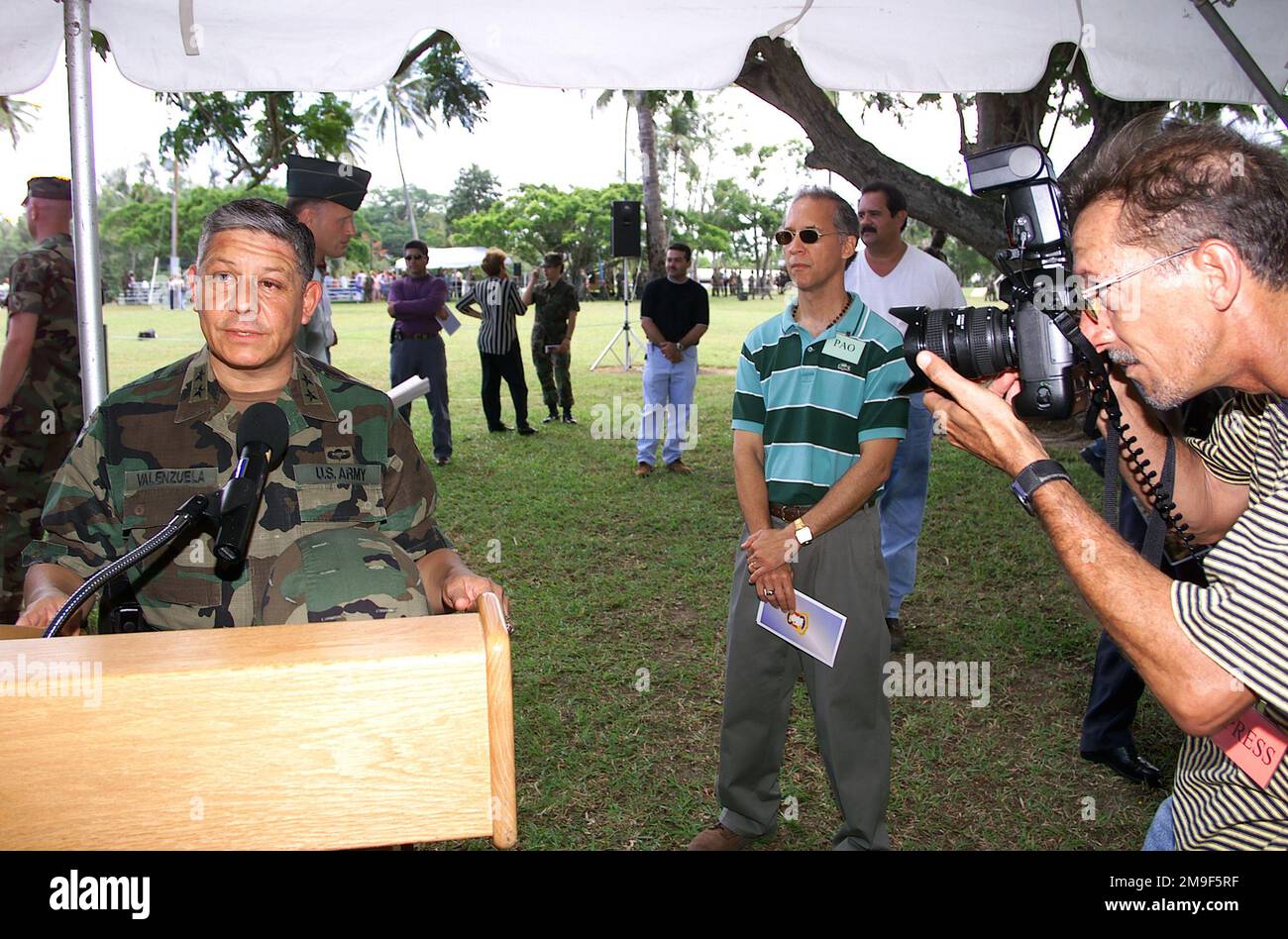 Photographer Tito Guzman from the newspaper EL NUEVO DIA (THE NEW DAY) focuses on the new Commanding General of US Army South, US Army Major General Alfred A. Valenzuela at Fort Buchanan, Puerto Rico, on his first press conference on the post. Base: Fort Buchanan, San Juan State: Puerto Rico (PR) Country: United States Of America (USA) Stock Photo