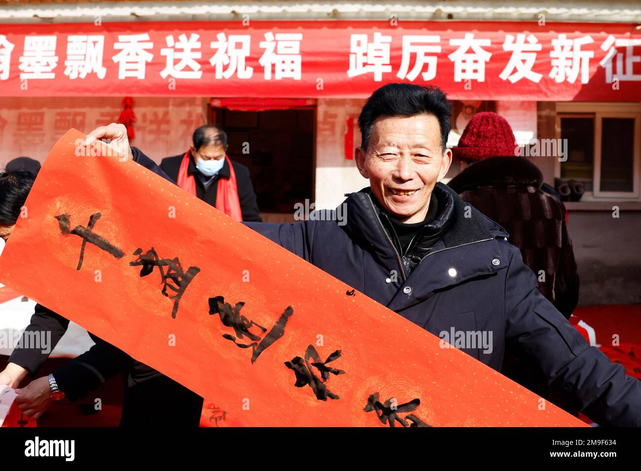 SUQIAN, CHINA - JANUARY 18, 2023 - Calligraphers wrote couplets to citizens to celebrate the lunar Year of the Rabbit. January 18, 2023, Suqian City, Stock Photo