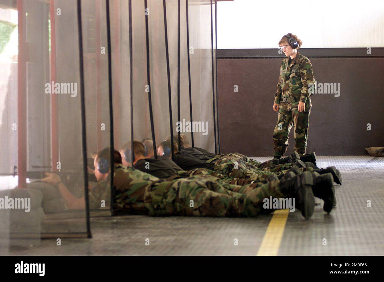 Sean Slayback Left side front view medium long shot as US Air Force STAFF Sergeant ...