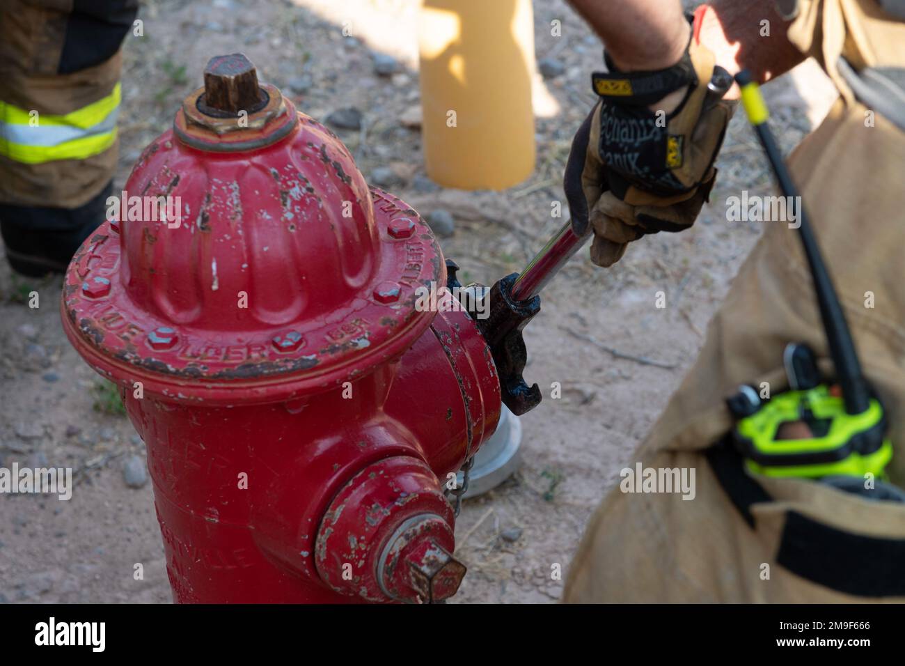 https://c8.alamy.com/comp/2M9F666/an-airman-from-the-49th-civil-engineer-squadron-secures-a-fire-hydrant-during-an-emergency-response-training-exercise-may-19-2022-on-holloman-air-force-base-new-mexico-in-order-to-connect-a-fire-hose-to-a-fire-hydrant-the-airman-must-remove-the-outlet-of-it-to-connect-a-fire-hose-adapter-2M9F666.jpg