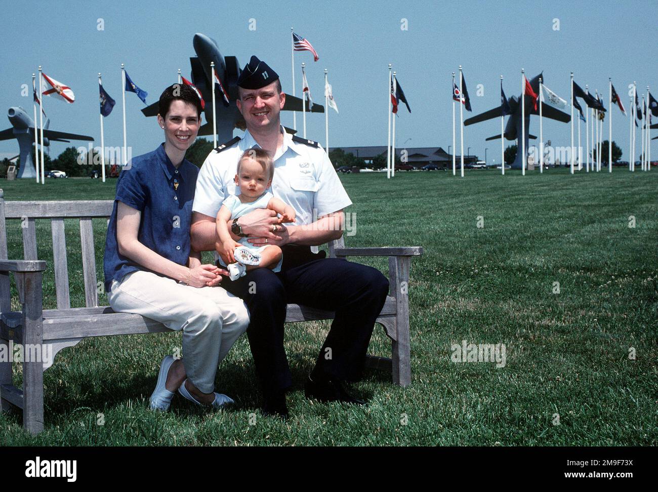 US Air Force Captain Dale Reed, his wife Kerri and their 11-month-old son Andrew pose for a photo at Langley AFB, VA. Kerri was diagnosed with cancer just three months before Andrew was borne. From AIRMAN Magazine, Aug 2000 Article 'Kerri's Hope'. US Air Force Captain Dale Reed, his wife Kerri and their 11-month-old son Andrew pose for a photo at Langley AFB, VA. Kerri was diagnosed with cancer just three months before Andrew was borne. From Airman Magazine, Aug 2000 Article 'Kerri's Hope'. Stock Photo