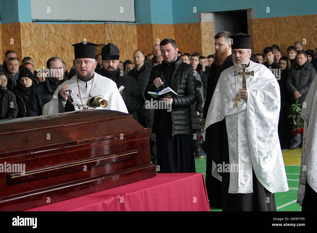 DNIPRO, UKRAINE - JANUARY 17, 2023 - Priests conduct the funeral service of Ukrainian boxer, Merited Coach of Ukraine and head coach of the boxing tea Stock Photo