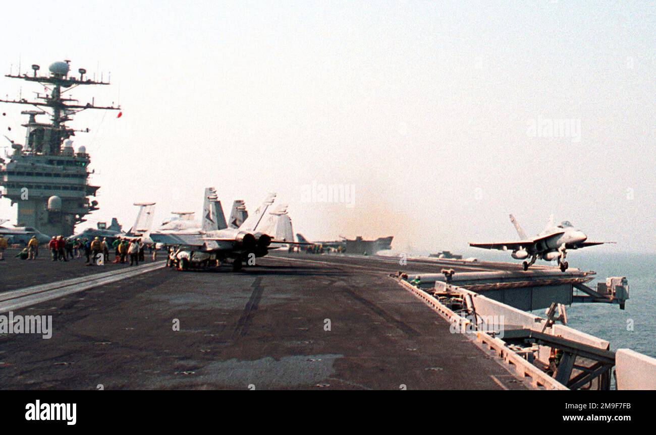F a 18 hornet strike fighter launches from the flight deck of the