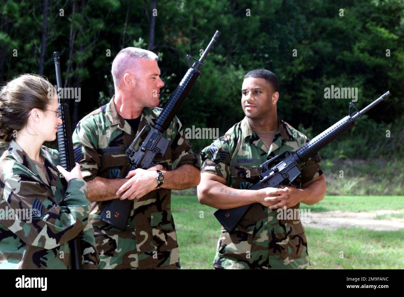 US Air Force Security Force members of the 245th Air Traffic Control Squadron (ATCS) stand ready after being issued their M-16s. The 245th ATCS is undergoing its first ORI. The squadron is a Geographically Separated Unit (GSU) located on McEntire Air National Guard Station, Eastover, South Carolina.(U.S. Air Force PHOTO by: SSG Gerold O. Gamble). Subject Operation/Series: 245TH AIR TRAFFIC CONTROL SQUADRON ORI Base: Mcentire Ang Station State: South Carolina (SC) Country: United States Of America (USA) Stock Photo