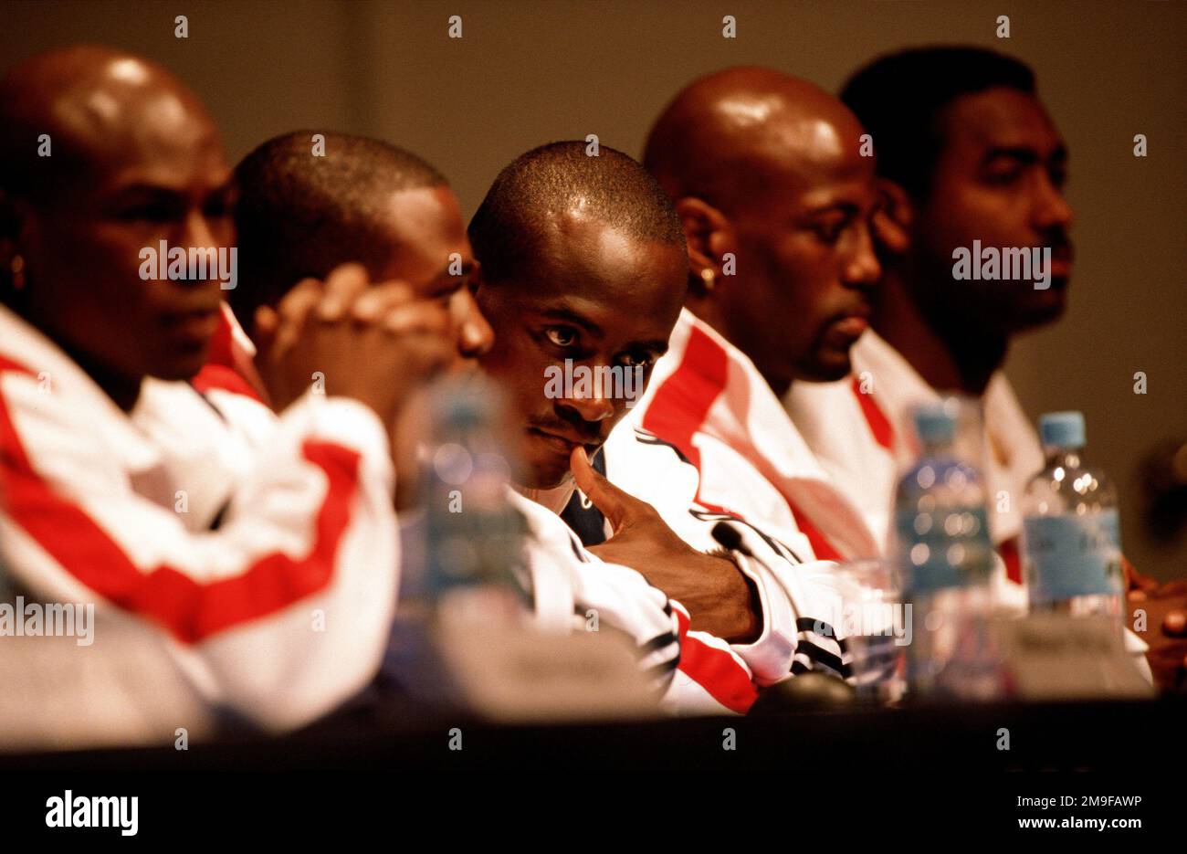 Orlanda Anderson, 27, third from the left, a US Army STAFF Sergeant stationed at Fort Carson, Colorado, sits amongst his teammates on the US Olympic Boxing Team during a press conference on September 13th, 2000 at the Sydney Olympic Park in Sydney, Australia. Anderson, a light heavyweight boxer, is the first Army boxer to make the Olympic Team since 1988. Base: Sydney Olympic Park State: New South Wales Country: Australia (AUS) Stock Photo