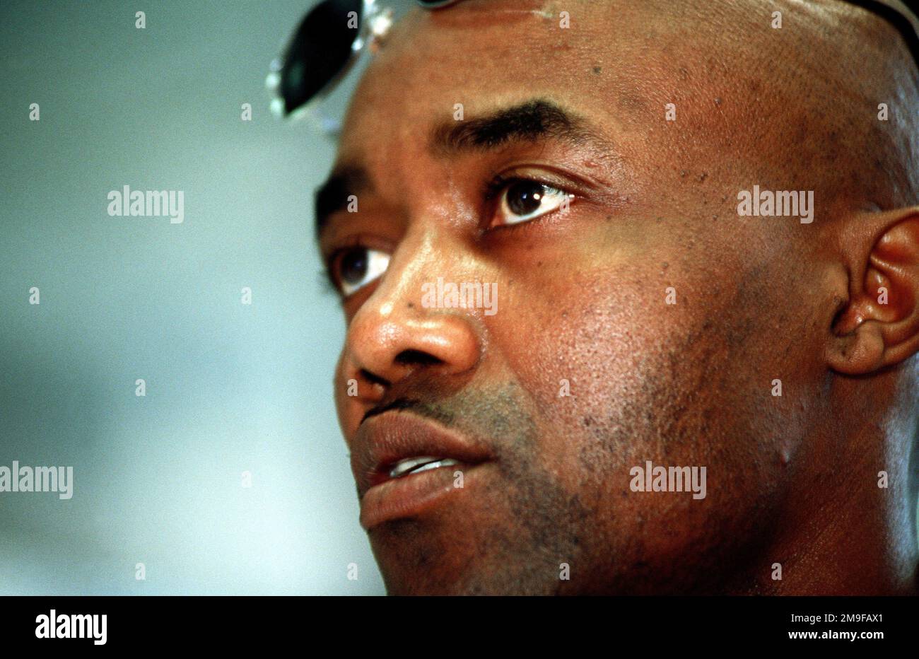An extreme left side front close-up shows US Army STAFF Sergeant Basheer Abdullah, a member of the coaching staff with the 2000 US Olympic Boxing Team. Abdullah was speaking to journalists following a press conference September 13th, 2000, at the Sydney Olympic Park in Sydney, Australia. Base: Sydney Olympic Park State: New South Wales Country: Australia (AUS) Stock Photo