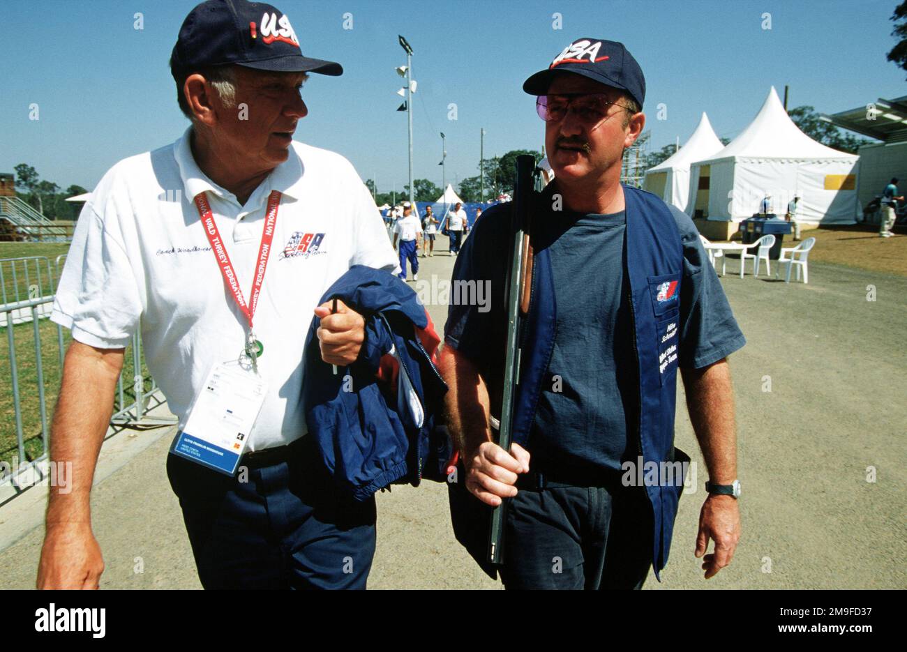 Straight on, medium shot of US Army Sergeant Michael Schmidt Jr. (right ...