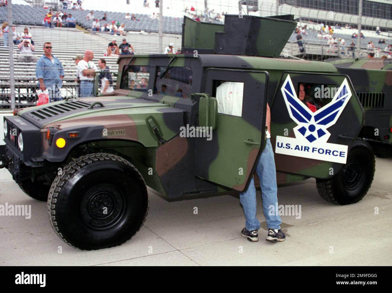 Members of the 436th Security Forces Squadron, Dover Air Force Base, Delaware, display their High-Mobility Multipurpose Wheeled Vehicles (HMMWV), which led the lead lap before the start of the MBNA 400 held at Dover Downs International Speedway, Delaware, on September 24, 2000. Base: Dover State: Delaware (DE) Country: United States Of America (USA) Stock Photo