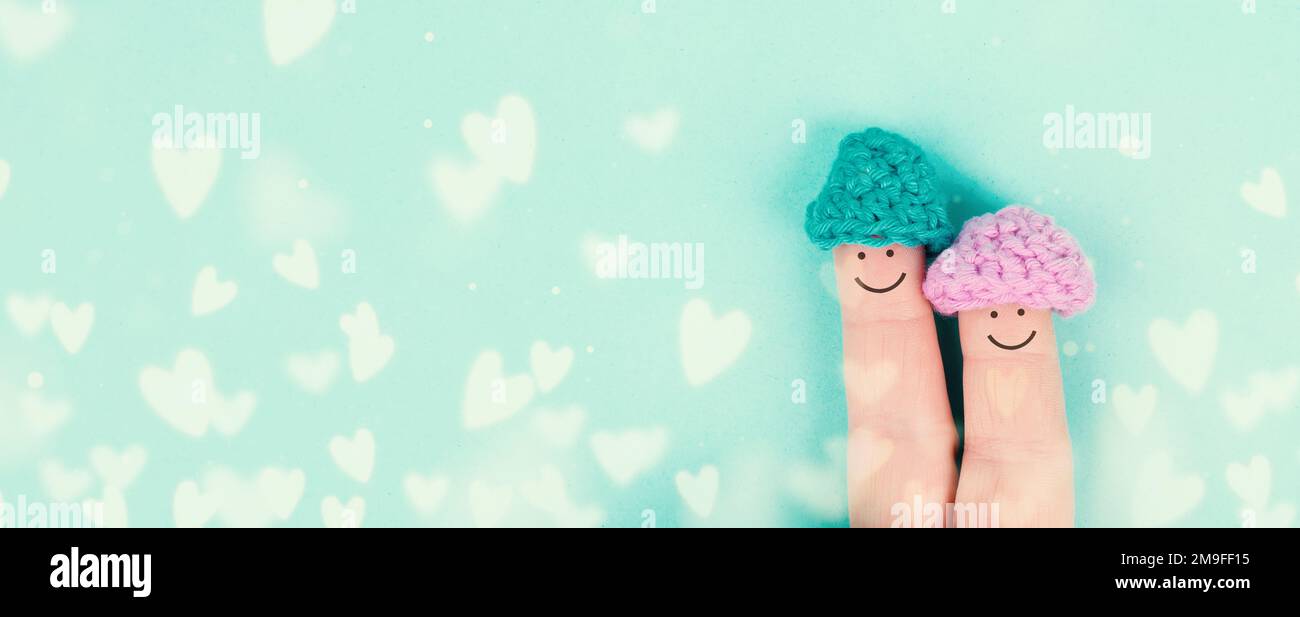 Happy, similing face on finger, couple cuddle together, love, relationship and friendship