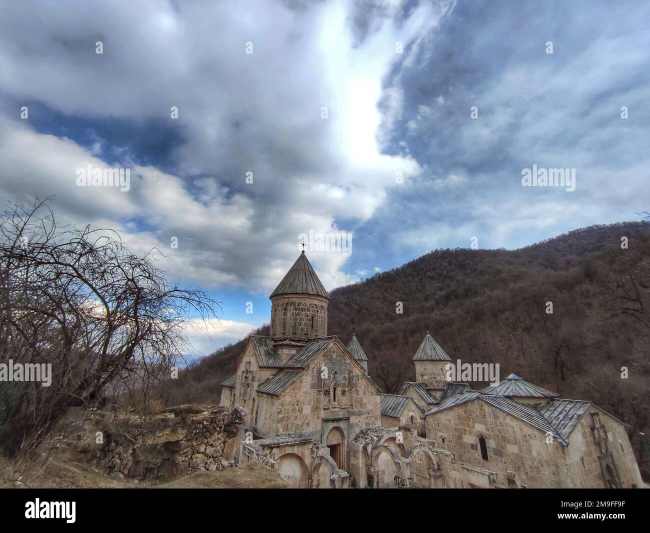 A drone shot of the Haghartsin Monastery in Dilijan, Tavush, Armenia, under the cloudy sky Stock Photo