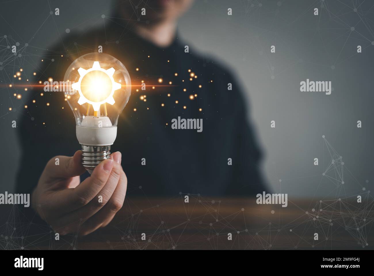 Innovation design concept. Hand holding light bulb for new idea brain ...