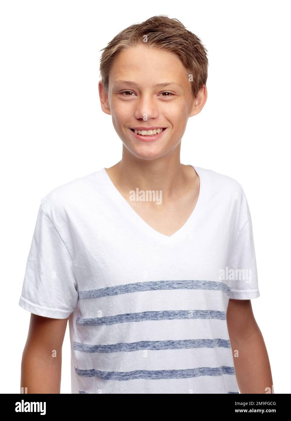 Boy, kid and happy portrait in studio, white background and isolated alone. Face, smile and young child, model and casual kids lifestyle for healthy Stock Photo