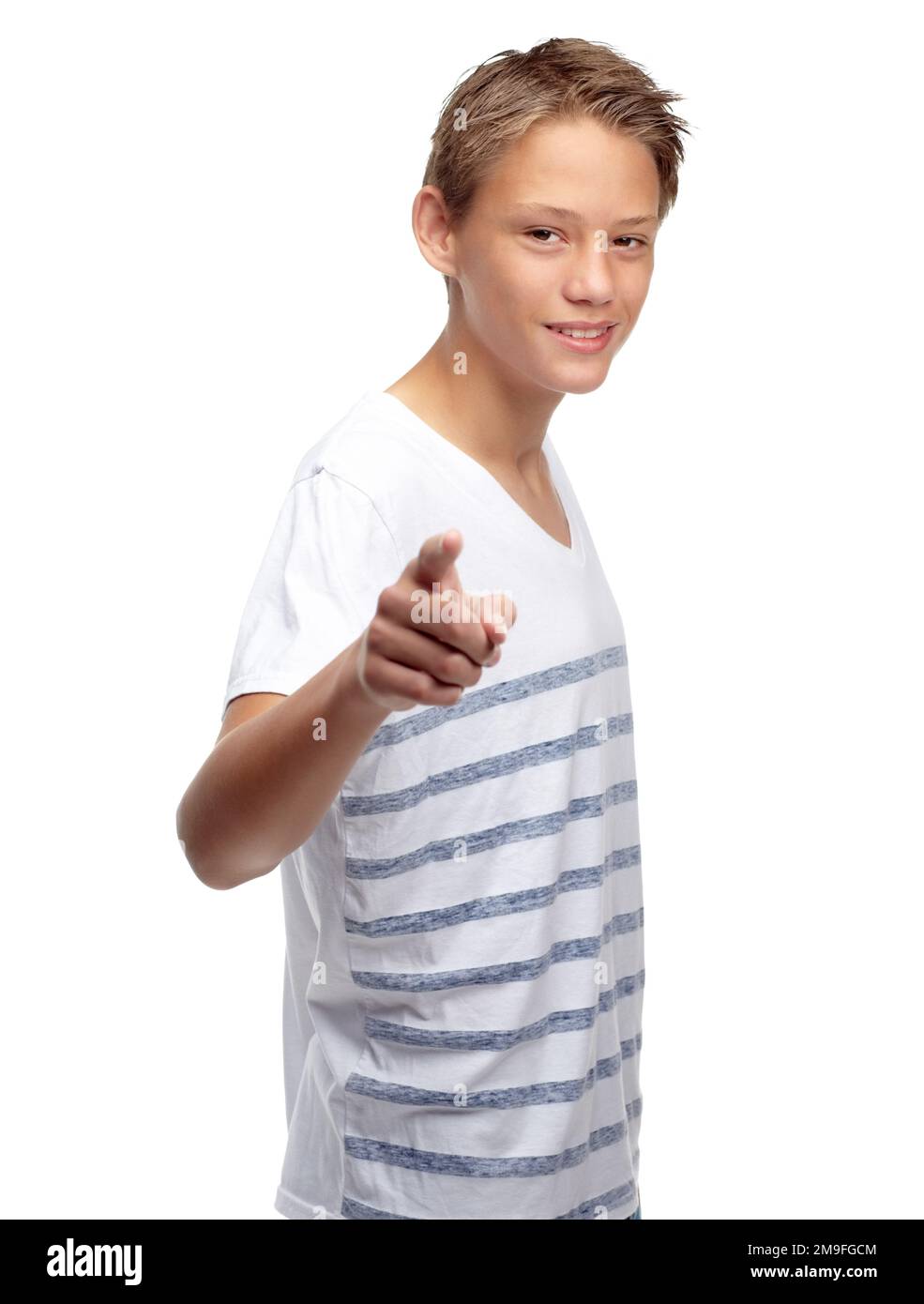 Children, portrait and pointing with a boy in studio isolated on a white background for branding or marketing. Kids, hand and point with a male child Stock Photo