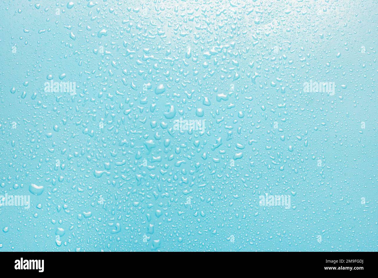Water drops on a green, blue background. Texture top view Stock Photo