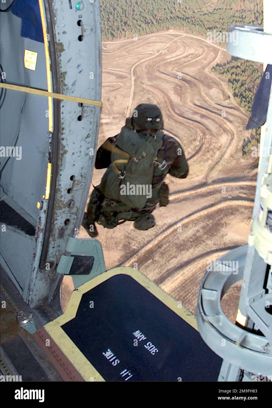 a-jumpmaster-from-the-82nd-airborne-jumps-out-of-a-mcguire-air-force