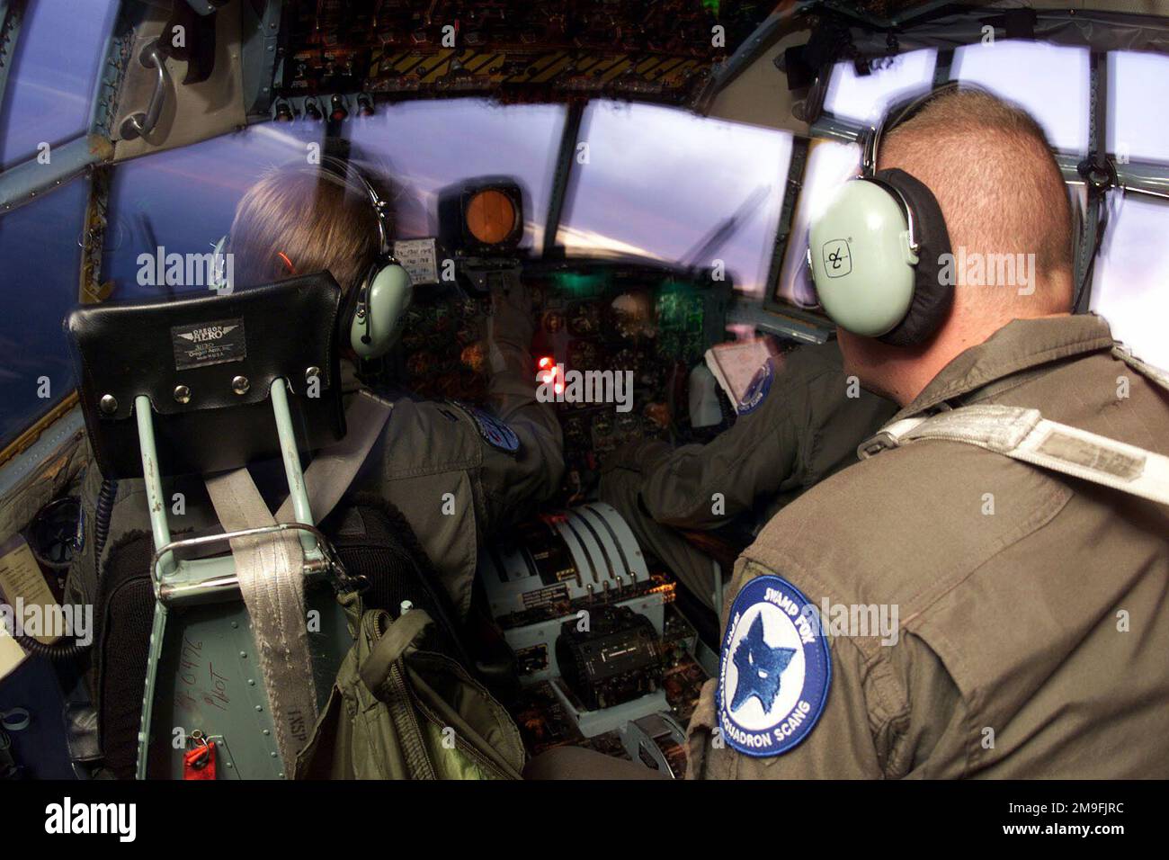 An interior view of the cockpit of a C-130E Hercules aircraft from the