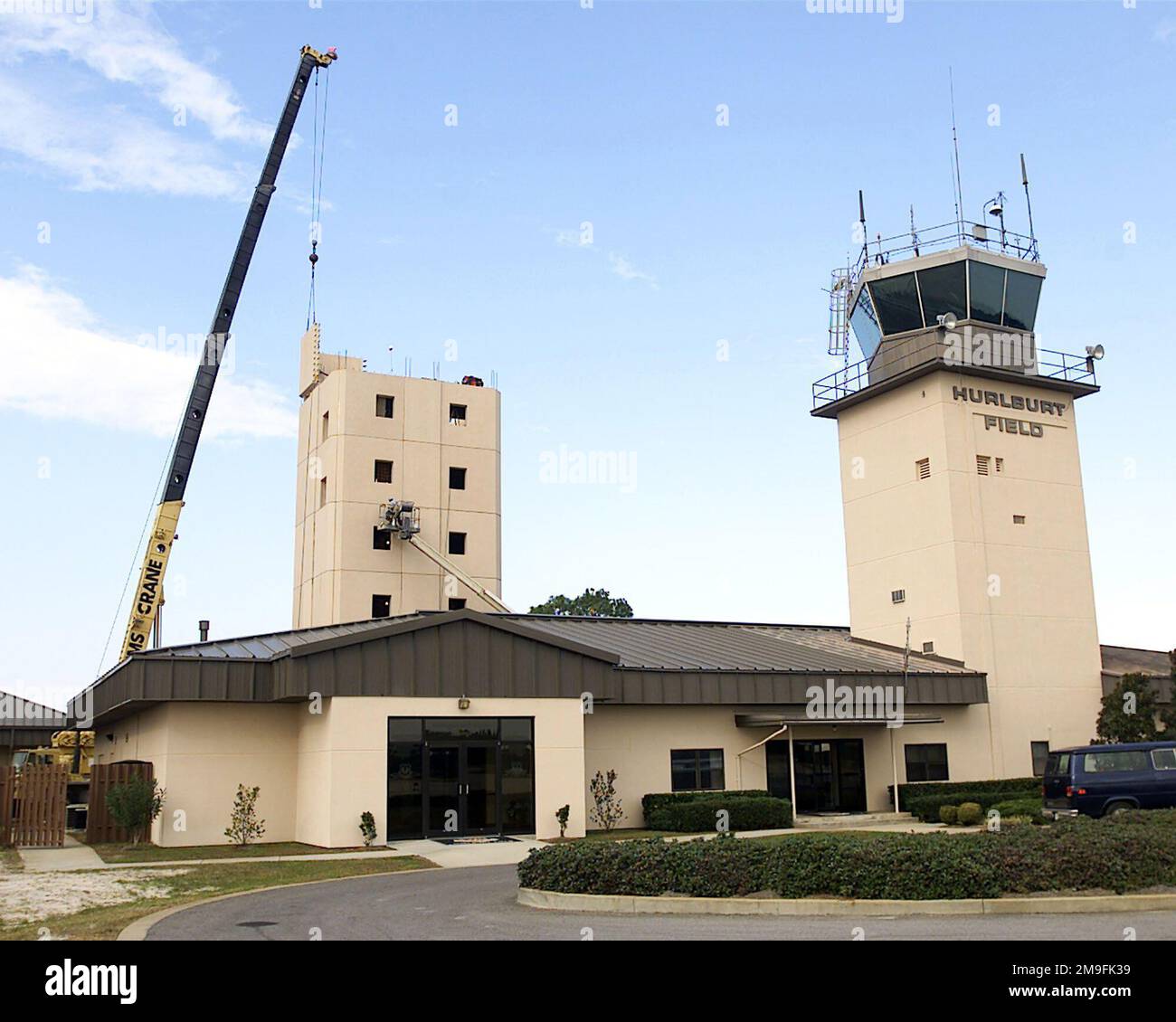 Northwest view of the construction - Northwest View Of The Construction Of A New Air Traffic Control Tower With The Old Air Traffic Control Tower And Base Operations In Foreground At Hurlburt Field Florida Base Hurlburt Field State Florida Fl Country United States Of America Usa 2M9FK39 