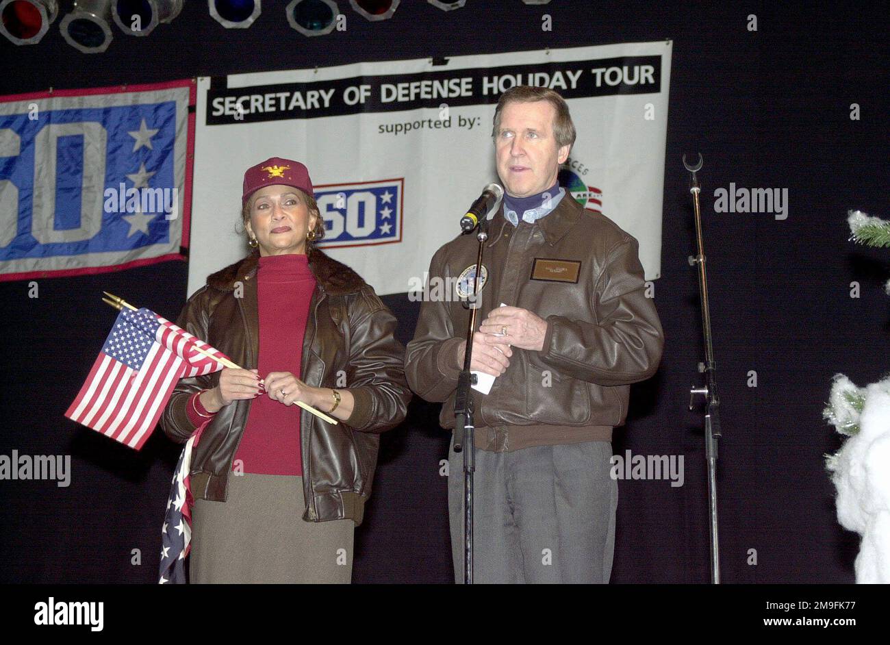 Secretary of Defense William S. Cohen and wife Mrs. Janet Langhart Cohen address the audience at Ramstein Air Base, Germany, during the Secretary of Defense's Holiday Show 2000. Base: Ramstein Air Base State: Rheinland-Pfalz Country: Deutschland / Germany (DEU) Stock Photo